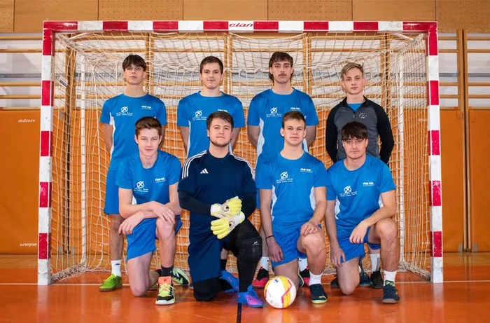 I kneel in goalkeeper equipment with the DD AMS futsal team