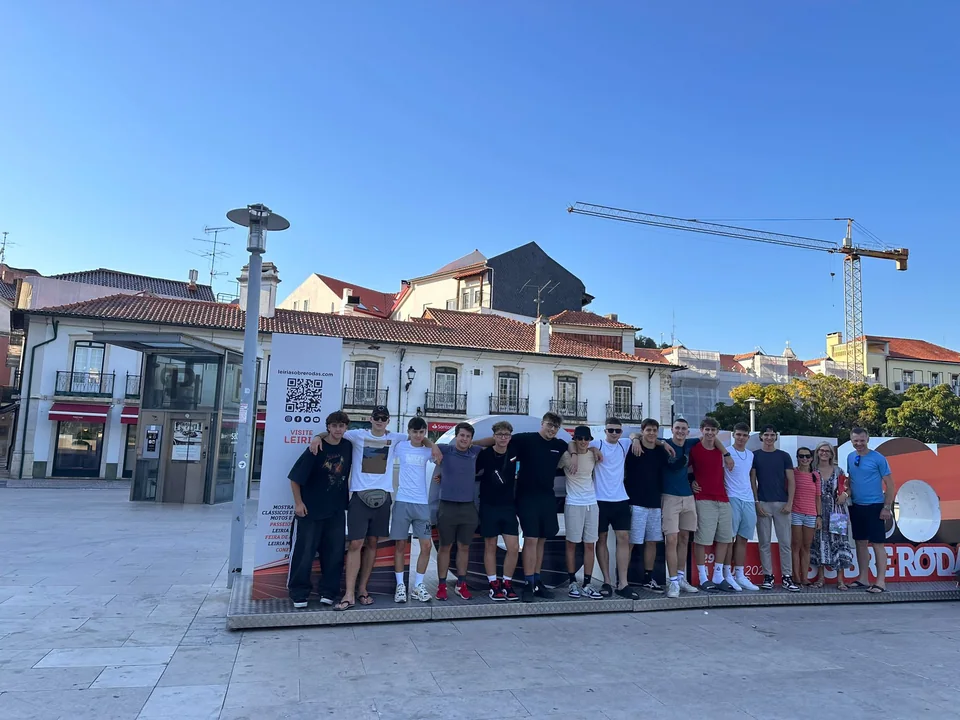 SERS student group posing together in a public square in Leiria